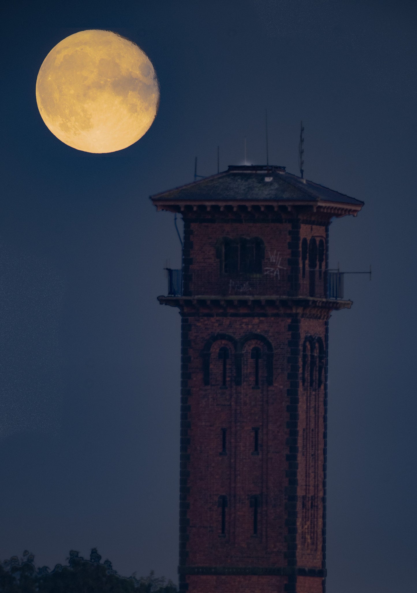 Moon rise at the water tower