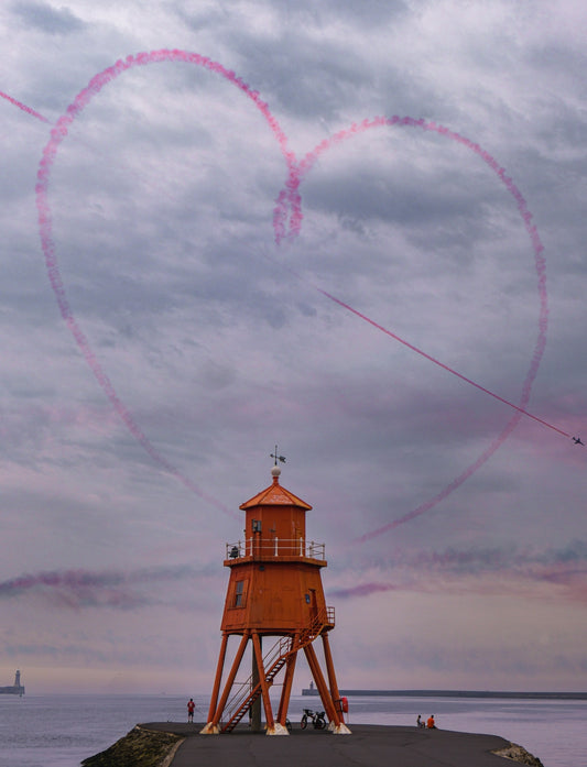 Red arrow love heart at the groyne